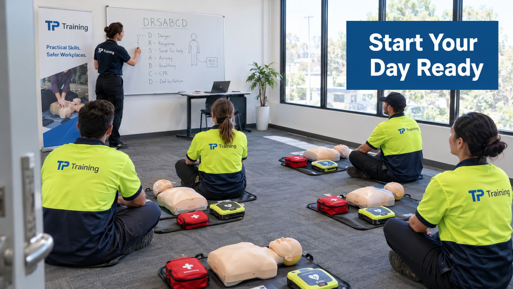 A professional CPR training class in session with students practicing resuscitation on mannequins guided by an instructor.